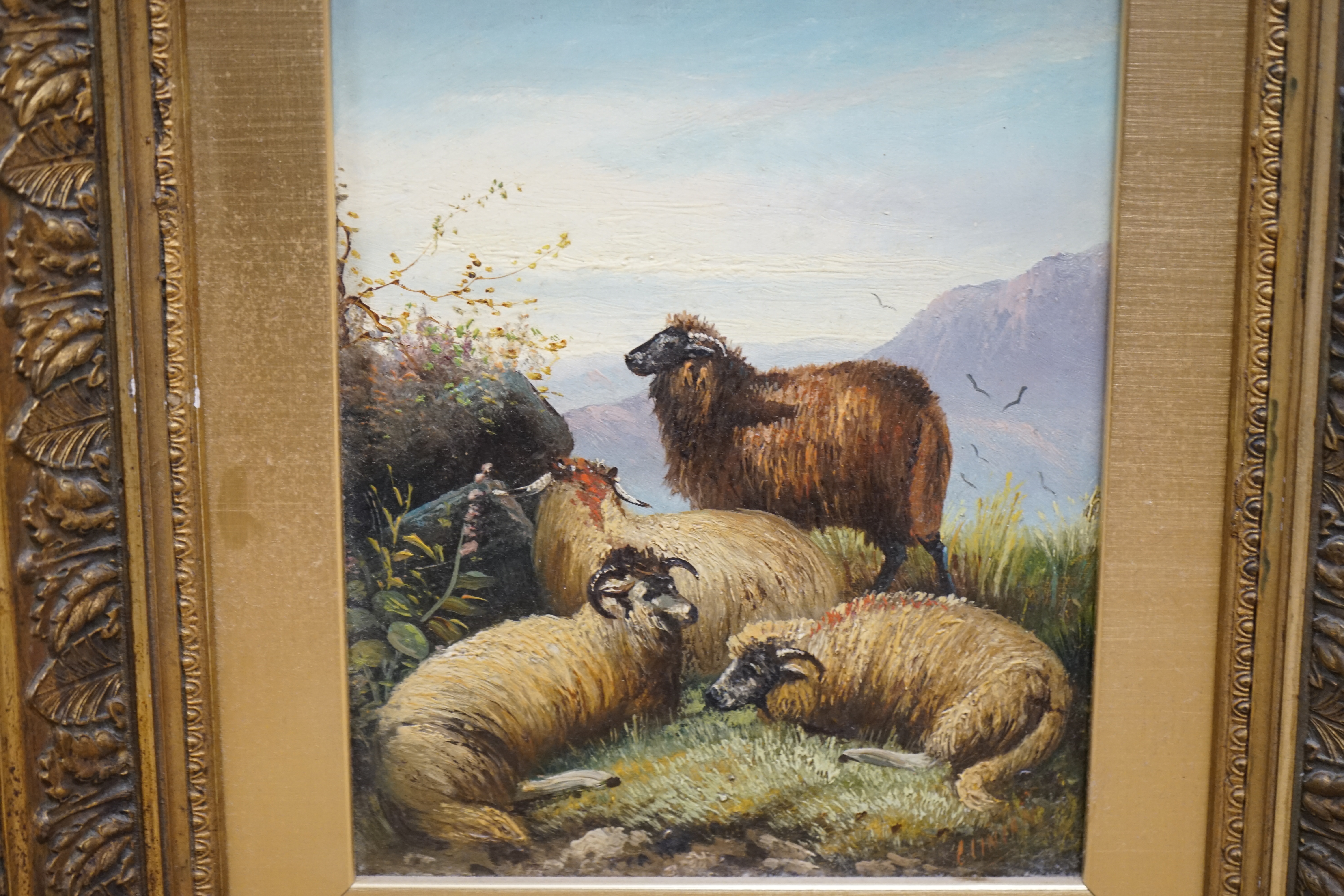 Two decorative oils on board, Flock of sheep before a landscape and Riverscape with cattle, largest 24 x 19cm, each gilt framed. Condition - fair